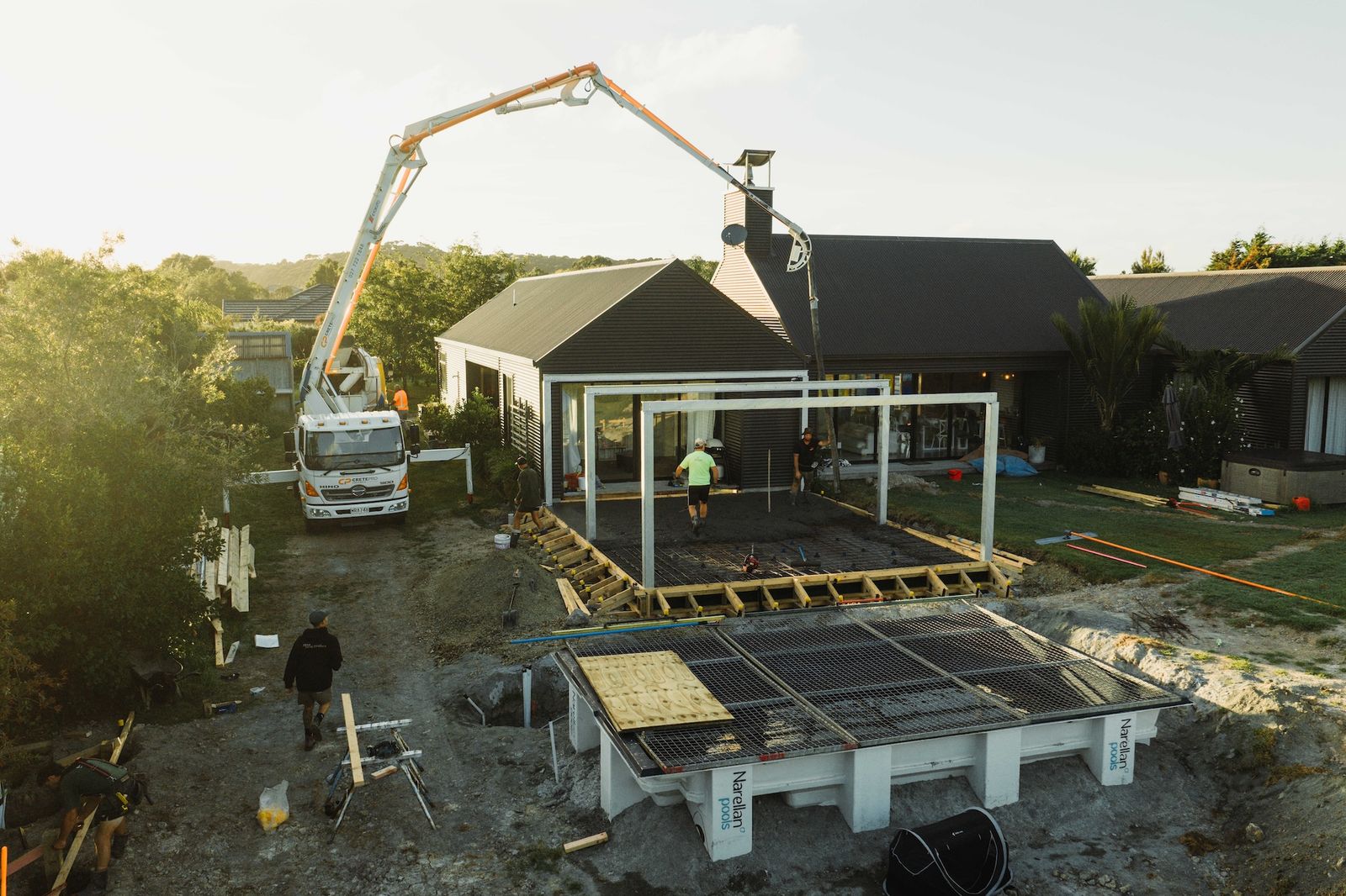 Outdoor area renovation with pool and concrete pour in Mangawhai Heads