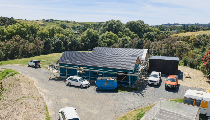 New home under construction near the Mangawhai coastline at golden hour